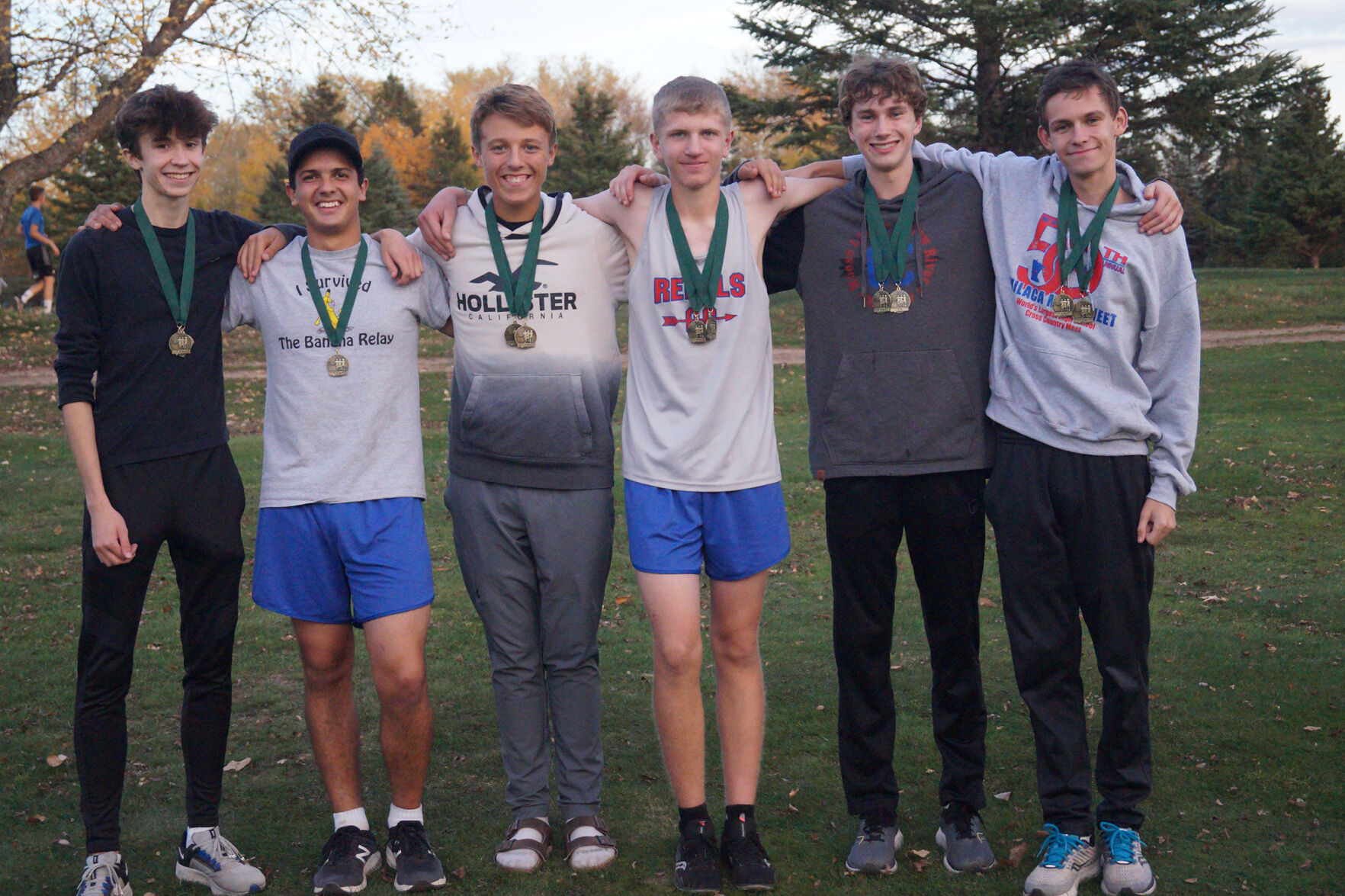 Cross Country Rebels Varsity boys team takes first place